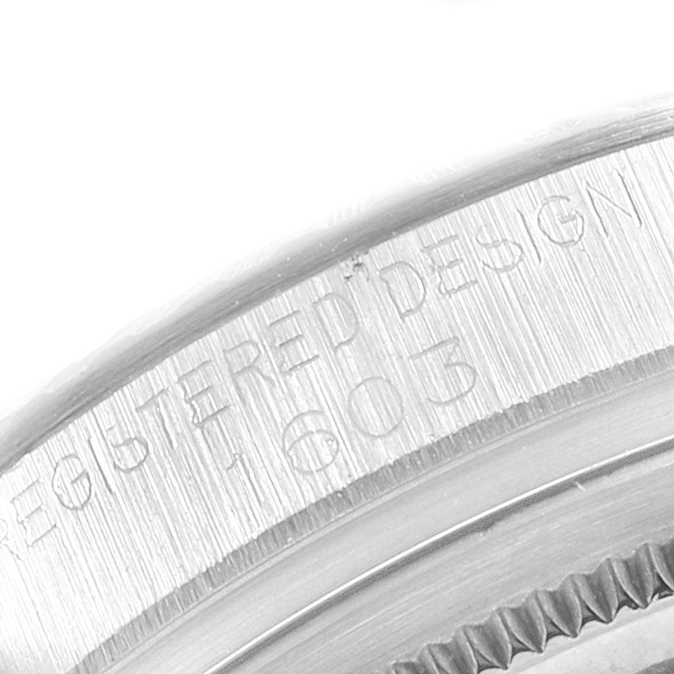 This is a close-up view of the case back edge and engraved text of the Rolex Vintage Collection 1603 Men's Stainless Steel Silver Dial 1603 Men's Stainless Steel Silver Dial model.