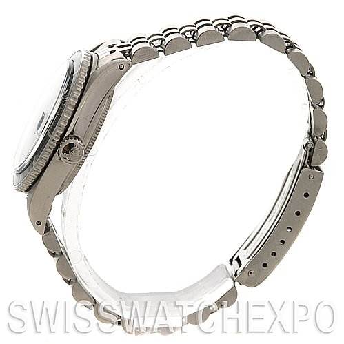 The image shows the side profile of a Tudor Submariner 90910 Men's Stainless Steel Black Dial 90910 Men's Stainless Steel Black Dial watch, highlighting the case, crown, and bracelet.