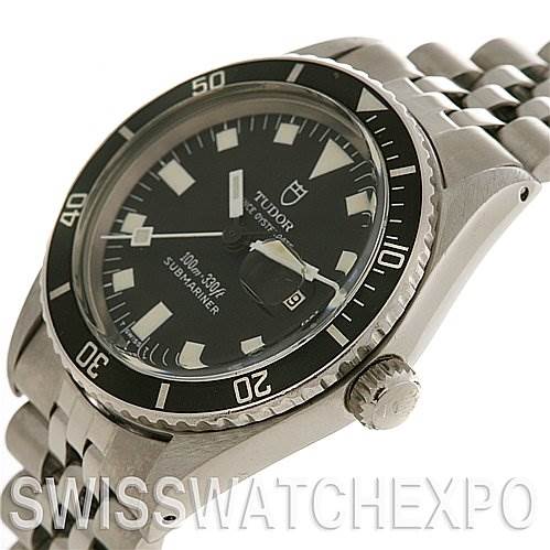 This image shows a side and partially top view of the Tudor Submariner 90910 Men's Stainless Steel Black Dial 90910 Men's Stainless Steel Black Dial watch, highlighting its bezel, crown, and bracelet.