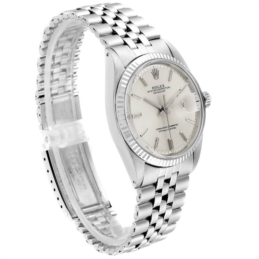 The image shows a side angle of a Vintage Collection Rolex watch, displaying its face, bezel, crown, and bracelet.