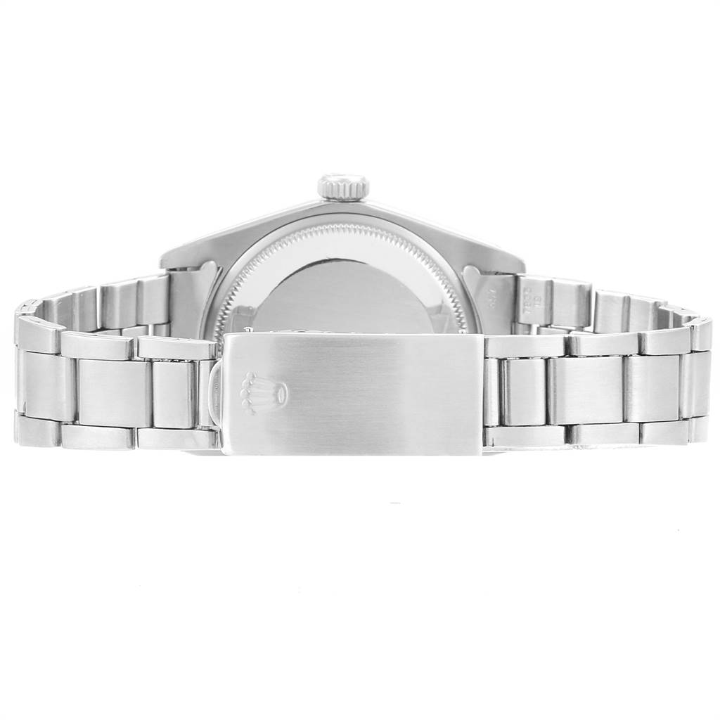 The image shows the back view of a Rolex Vintage Collection 1500 Men's Stainless Steel Grey Dial 1500 Men's Stainless Steel Grey Dial watch, highlighting its bracelet and clasp.