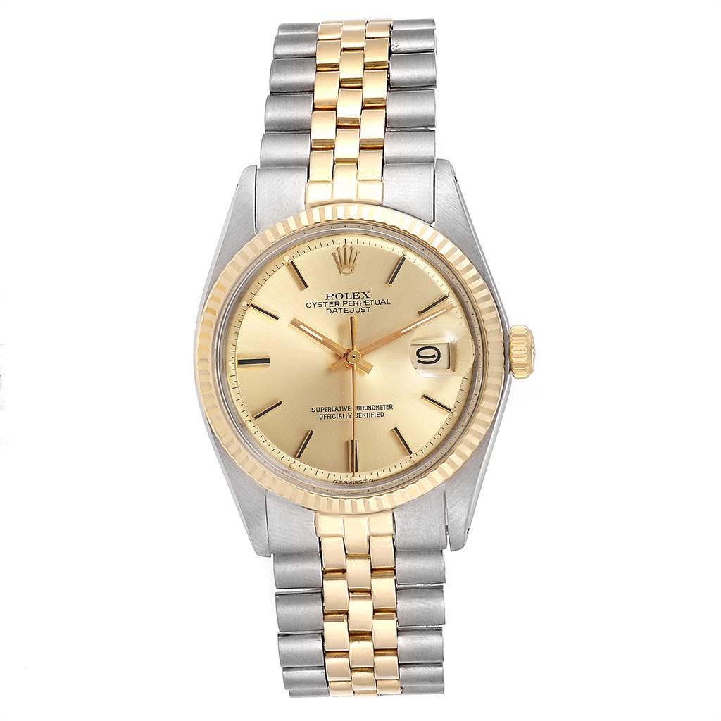 The Rolex Vintage Collection 1601 Men's Steel and Gold (two tone) Champagne Dial 1601 Men's Steel and Gold (two tone) Champagne Dial watch is shown from a top-down angle, highlighting its gold dial, bezel, and two-tone bracelet.