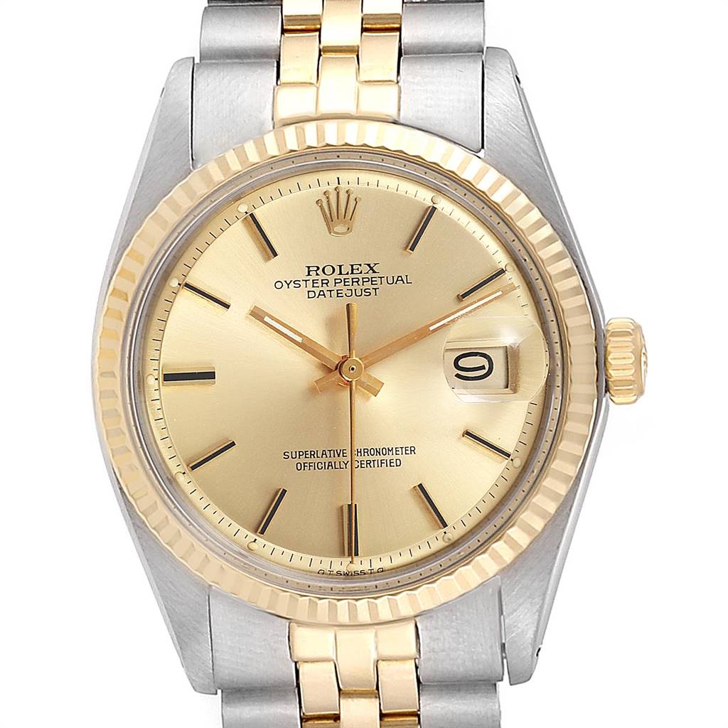 This image shows the face, bezel, and portion of the bracelet of the Rolex Vintage Collection 1601 Men's Steel and Gold (two tone) Champagne Dial 1601 Men's Steel and Gold (two tone) Champagne Dial Datejust in a straight-on angle.