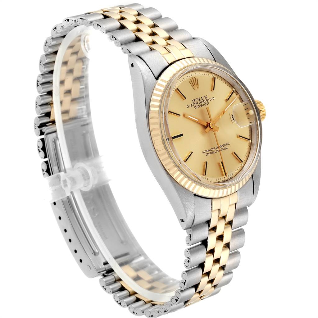The Rolex Vintage Collection 1601 Men's Steel and Gold (two tone) Champagne Dial 1601 Men's Steel and Gold (two tone) Champagne Dial model watch is shown from a front-side angle, displaying its dial, bezel, and two-tone bracelet.