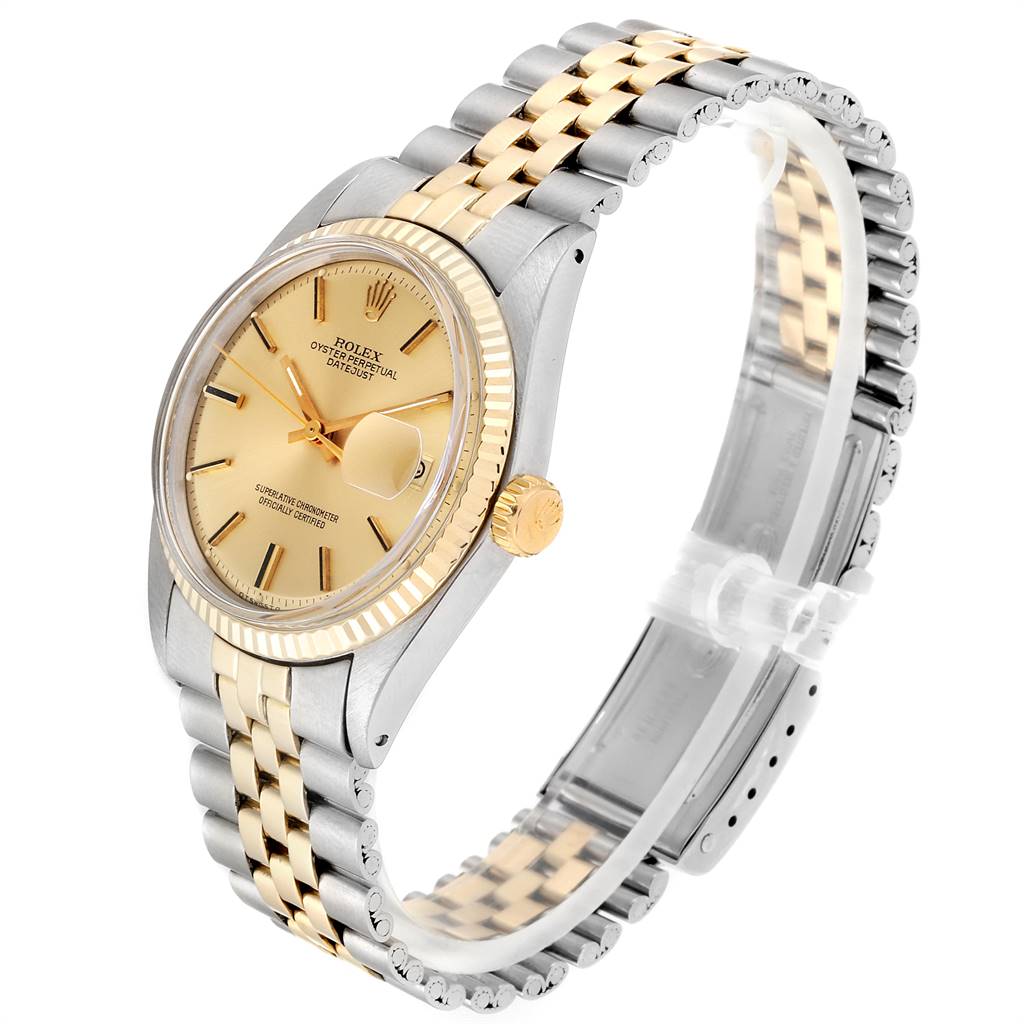 The Rolex Vintage Collection 1601 Men's Steel and Gold (two tone) Champagne Dial 1601 Men's Steel and Gold (two tone) Champagne Dial watch is shown at a slight angle, displaying the gold dial, date function, and two-tone metal bracelet.