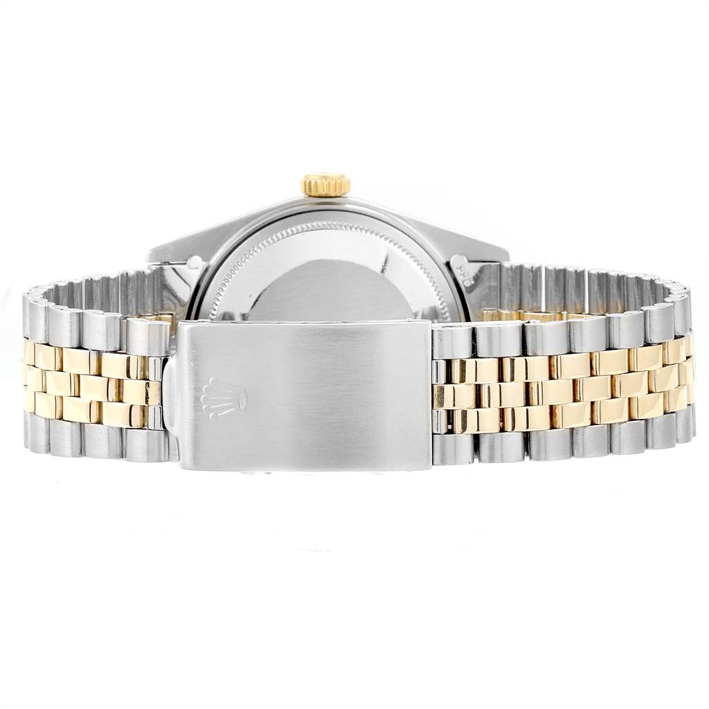 This image displays the back and strap of a Vintage Collection Rolex watch, highlighting its clasp and two-tone bracelet.