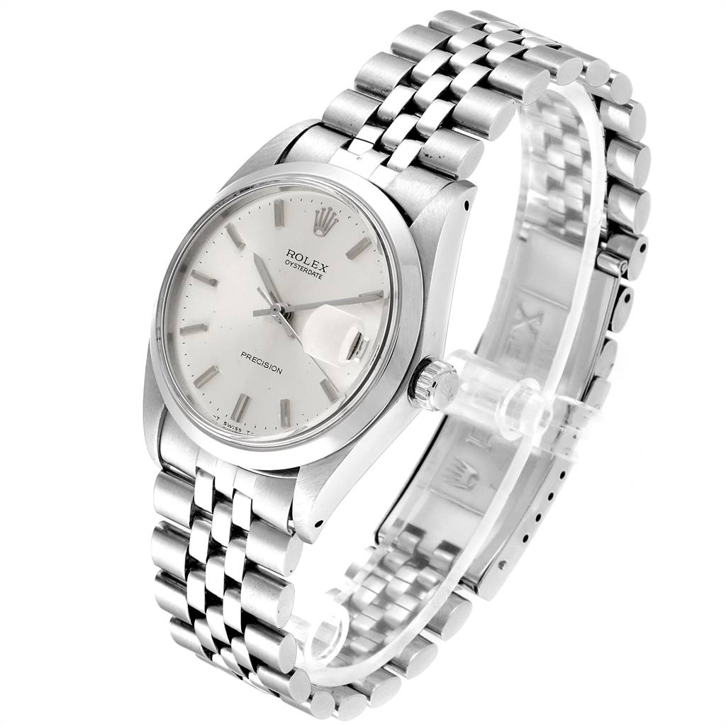 The image shows a Rolex Vintage Collection 6694 Men
s Stainless Steel Silver Dial 6694 Men
s Stainless Steel Silver Dial watch at a three-quarter angle, highlighting its dial, crown, and metal bracelet.