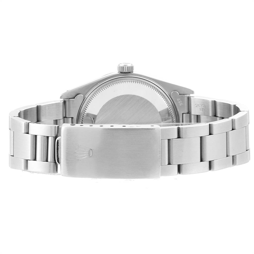 The image shows the back view of a Rolex Vintage Collection 15000 Men's Stainless Steel Blue Dial 15000 Men's Stainless Steel Blue Dial watch, highlighting the clasp, bracelet, and case back.