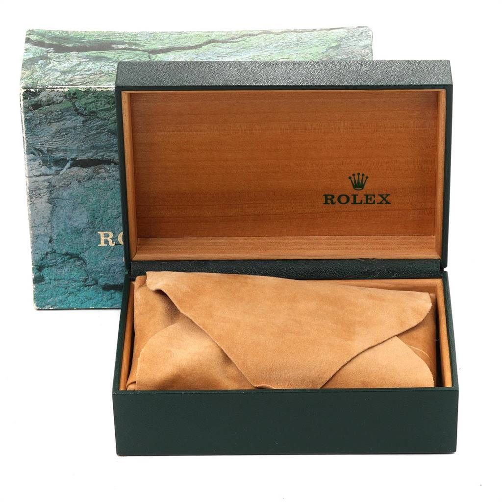 The image shows an open Rolex Vintage Collection 15000 Men's Stainless Steel Blue Dial 15000 Men's Stainless Steel Blue Dial watch box with a suede pouch inside.