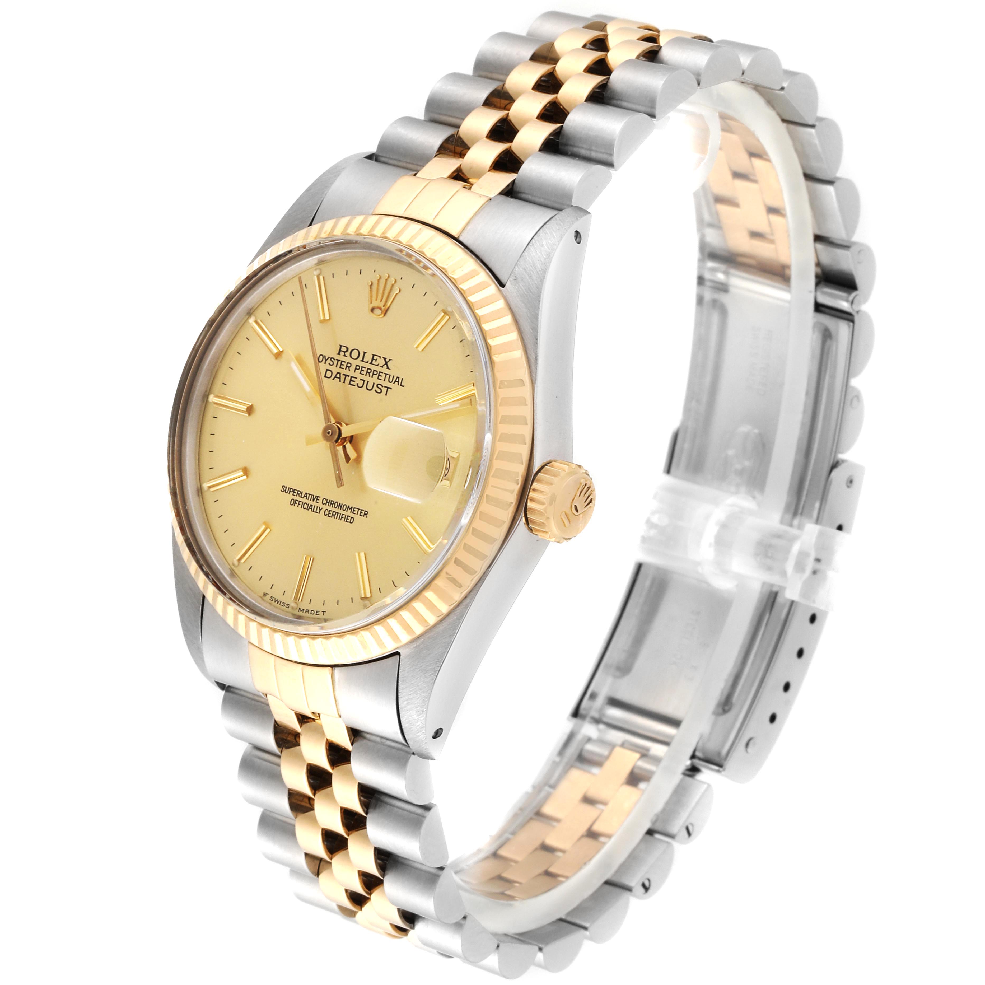 This image shows a side angle of the Rolex Vintage Collection 16013 Men's Stainless Steel Champagne Dial 16013 Men's Stainless Steel Champagne Dial watch, highlighting its bezel, dial, and two-tone bracelet.