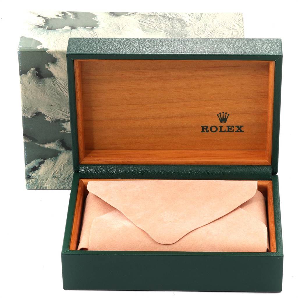 The image shows the open box of a Rolex Vintage Collection 16013 Men's Stainless Steel Champagne Dial 16013 Men's Stainless Steel Champagne Dial watch, showcasing the interior with a pouch inside.