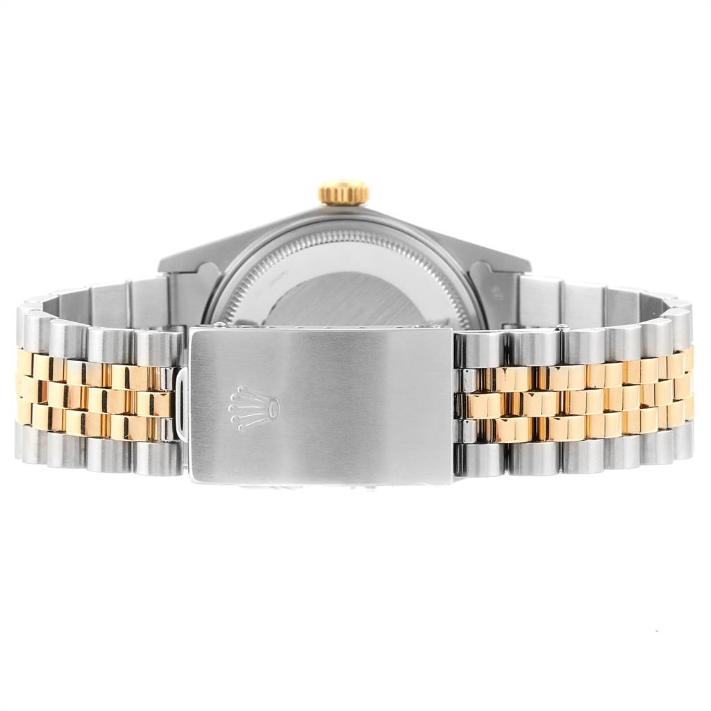 This image shows the back view of a Rolex Vintage Collection 16013 Men's Stainless Steel Champagne Dial 16013 Men's Stainless Steel Champagne Dial watch, highlighting the clasp and bracelet.