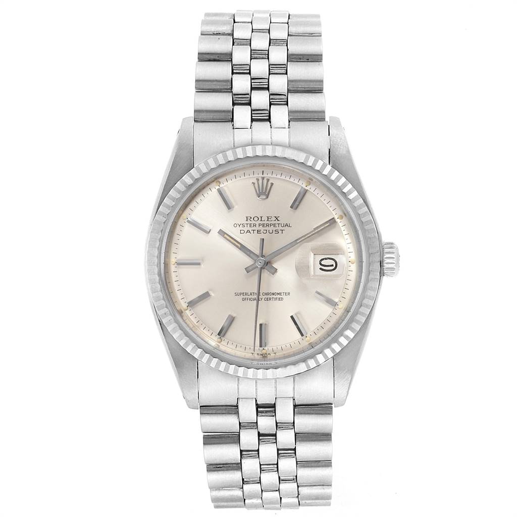 The image shows a front view of the Vintage Collection Rolex Oyster Perpetual Datejust with a silver bracelet and date display.