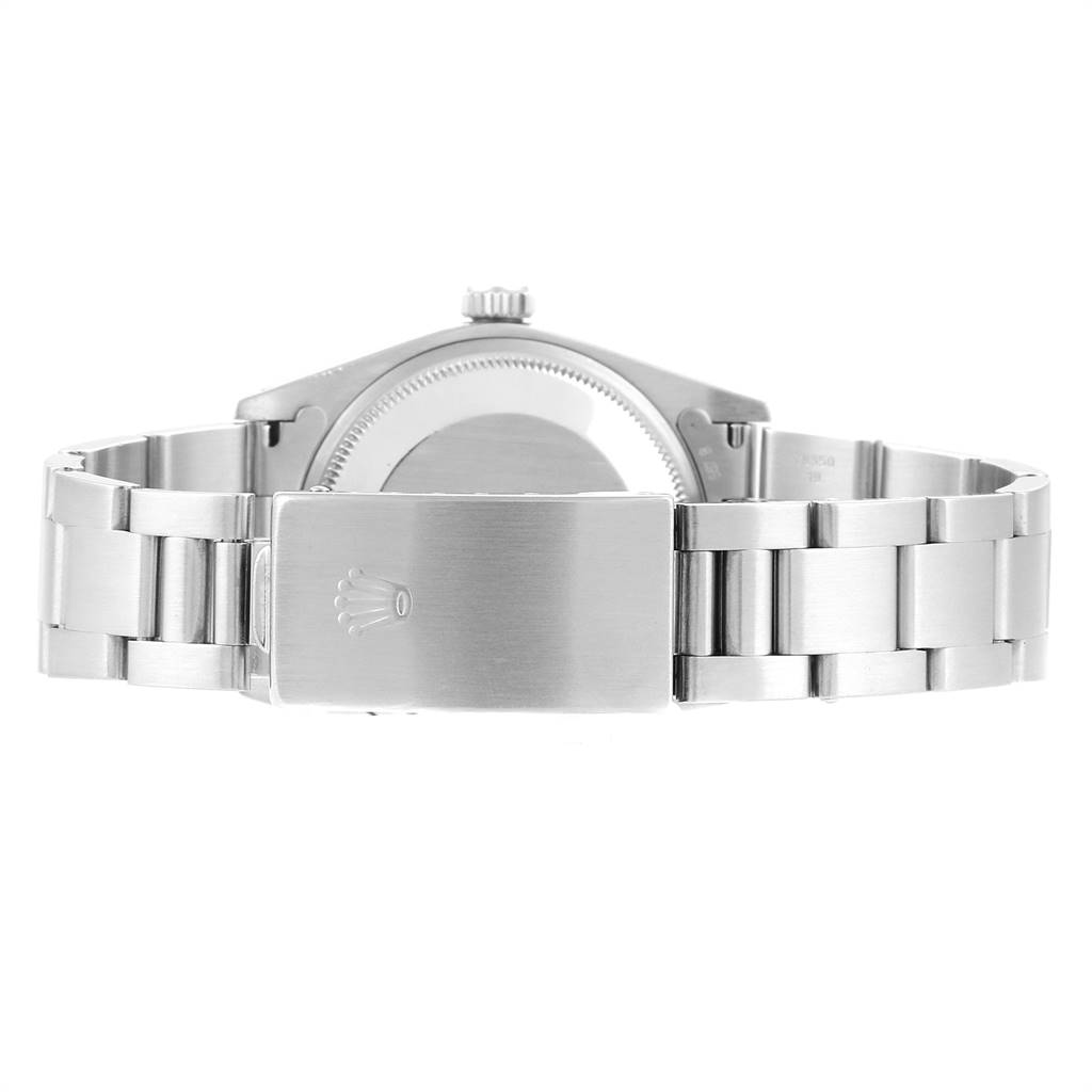 The image shows the backside and clasp of a Vintage Collection Rolex watch, highlighting the bracelet and caseback.