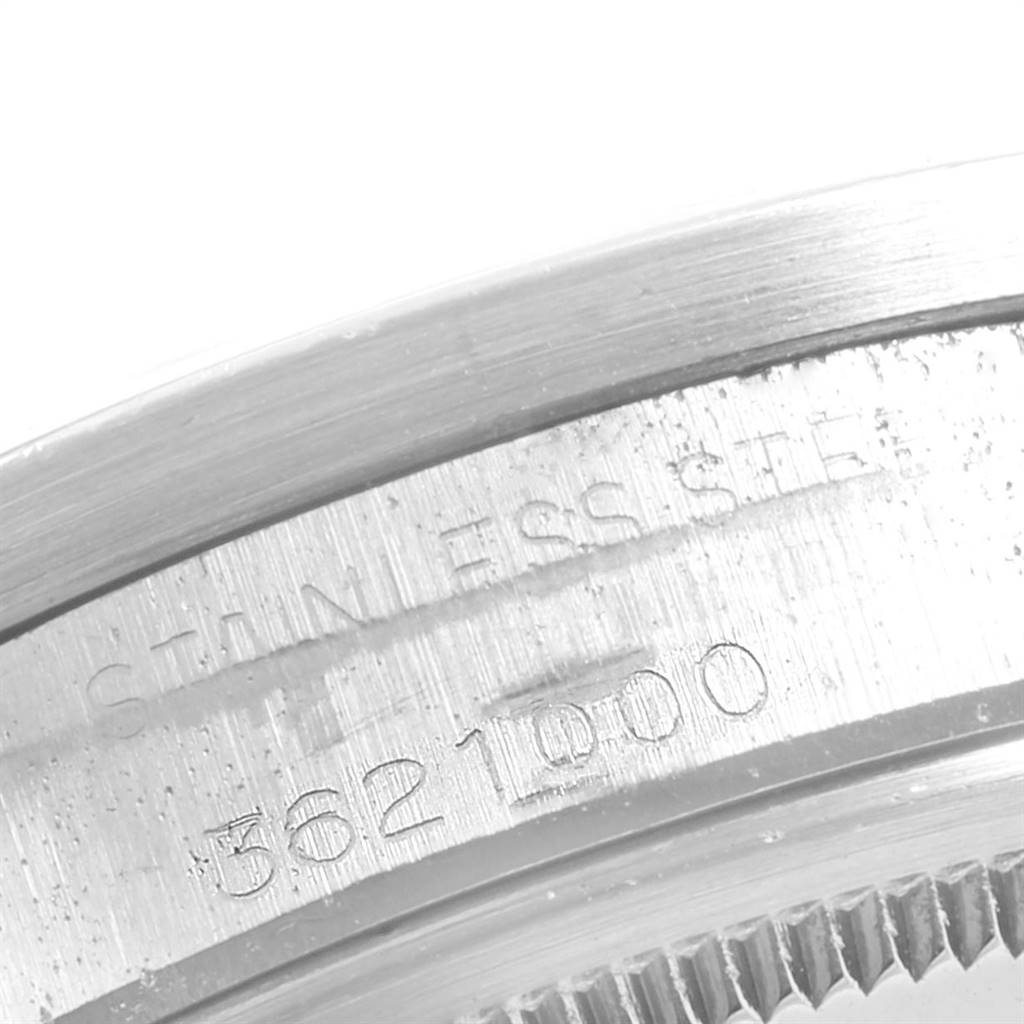 The image shows a close-up of the case back engraving of a Vintage Collection model by Rolex.