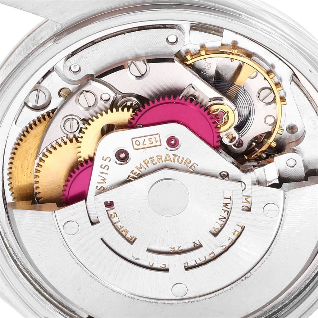 Close-up of the Vintage Collection model by Rolex showing the intricate internal gears and movement mechanism.