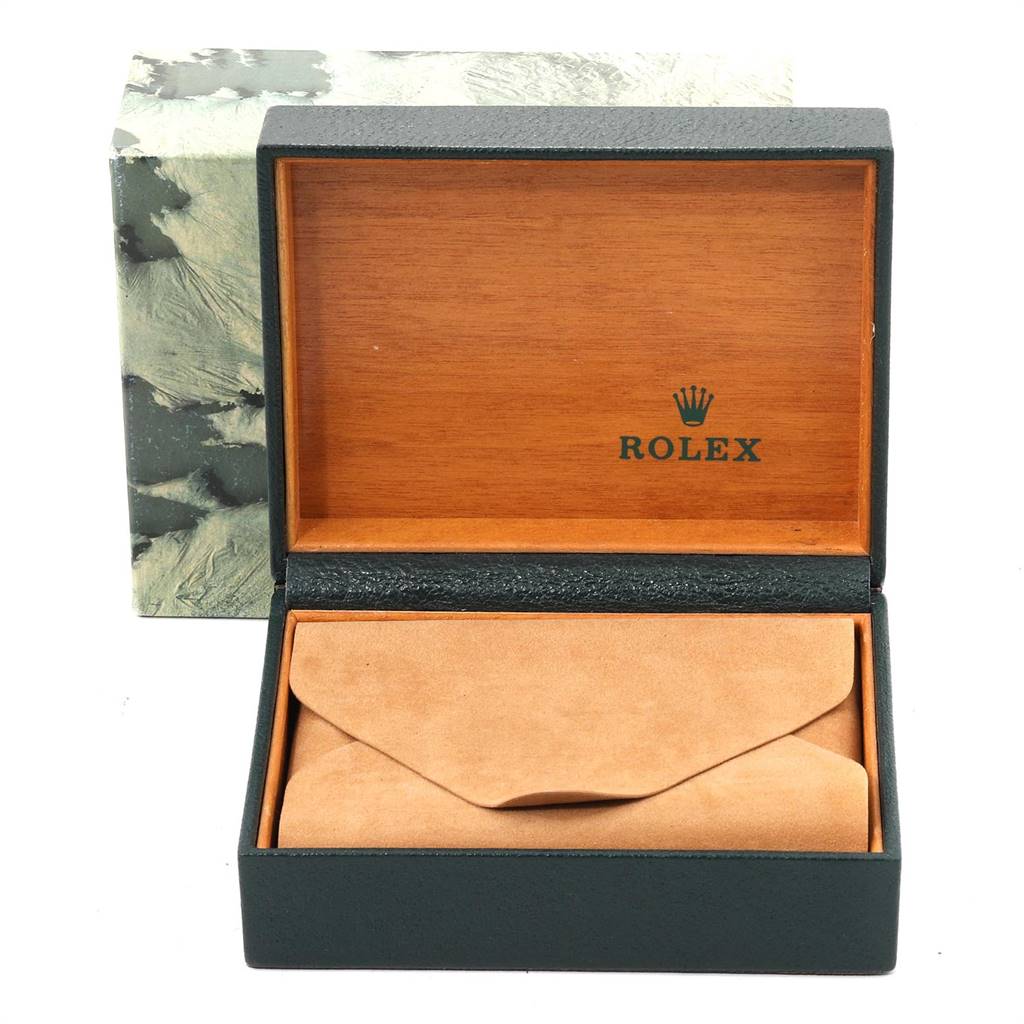 The image shows an open box for the Rolex Vintage Collection 1601 Men
s Steel and Gold (two tone) Champagne Dial 1601 Men
s Steel and Gold (two tone) Champagne Dial model with a protective pouch inside.