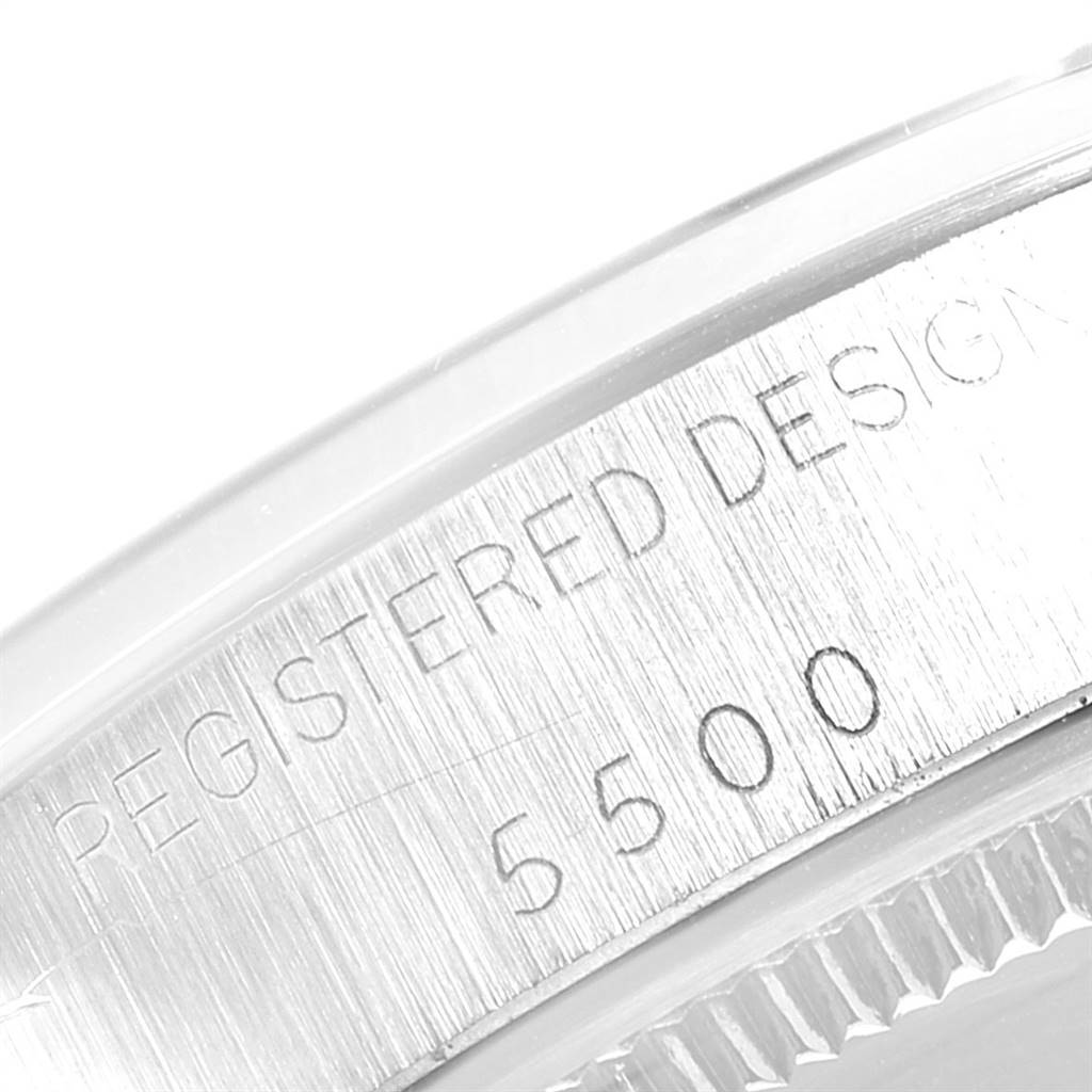 The image shows a close-up of the case side of a Rolex Vintage Collection 5500 Men's Stainless Steel Blue Dial 5500 Men's Stainless Steel Blue Dial model, focusing on the "REGISTERED DESIGN 5500" engraving.