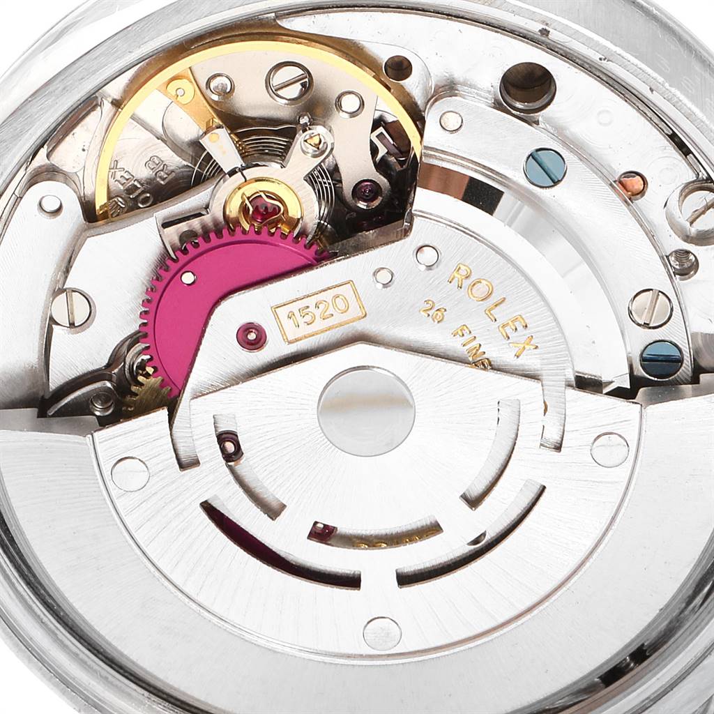 This image shows a close-up view of the internal movement mechanism of a Vintage Collection Rolex watch model 1520.