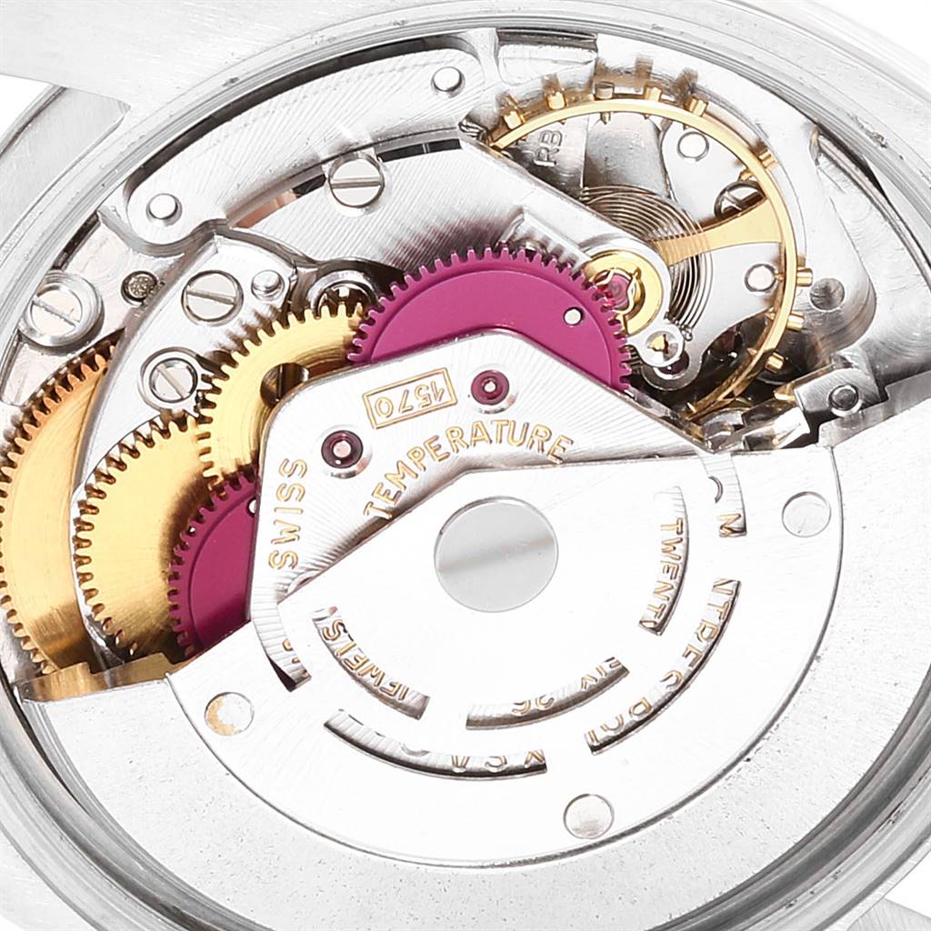 This image shows the intricate internal mechanical components of a Rolex Vintage Collection 1500 Men's Stainless Steel Silver Dial 1500 Men's Stainless Steel Silver Dial watch, viewed from the back.