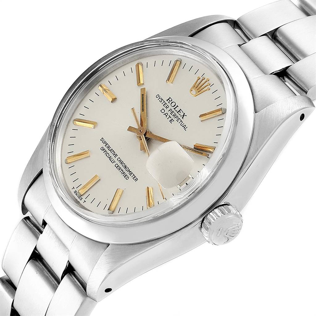This image shows a close-up angled view of the Rolex Vintage Collection 1500 Men's Stainless Steel Silver Dial 1500 Men's Stainless Steel Silver Dial watch face, crown, and part of the bracelet.