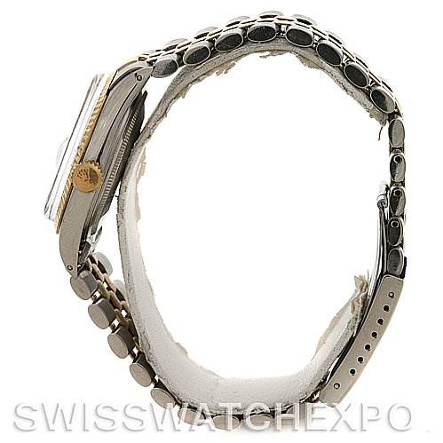 This side profile view of the Rolex Vintage Collection 1601 Men's Stainless Steel Silver Dial 1601 Men's Stainless Steel Silver Dial watch showcases the case, crown, and metal bracelet.