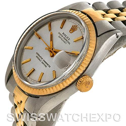 This image shows a side and partial front view of the Rolex Vintage Collection 1601 Men's Stainless Steel Silver Dial 1601 Men's Stainless Steel Silver Dial watch, highlighting its two-tone bracelet, crown, bezel, and dial with markers.