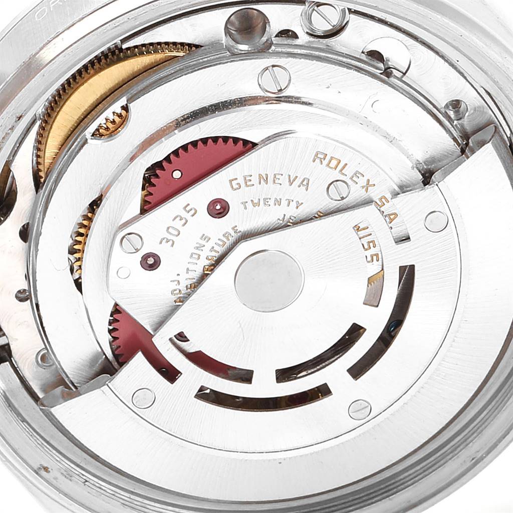 This close-up angle shows the intricate inner mechanism of a Rolex Vintage Collection 16014 Men's Stainless Steel White Dial 16014 Men's Stainless Steel White Dial model watch.