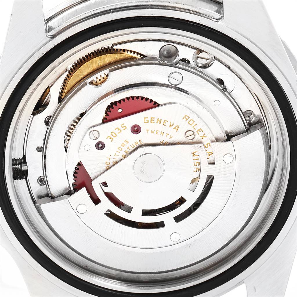 The image shows the back view of a Rolex Vintage Collection 16800 Men's Stainless Steel Black Dial 16800 Men's Stainless Steel Black Dial watch, revealing the intricate mechanical movement.