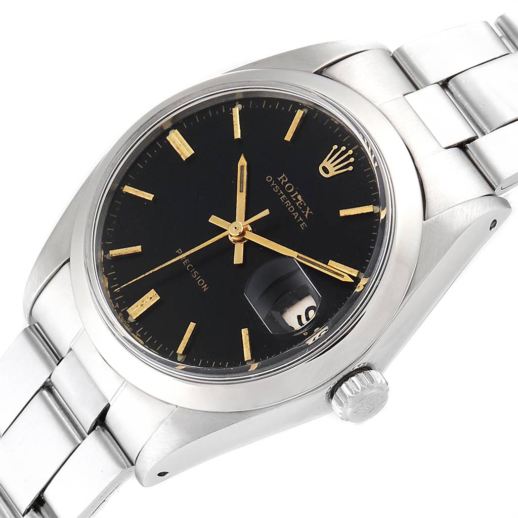 The Rolex Vintage Collection 6694 Men's Stainless Steel Black Dial 6694 Men's Stainless Steel Black Dial watch is shown at a slight angle, highlighting its black dial, gold markers, and silver bracelet.