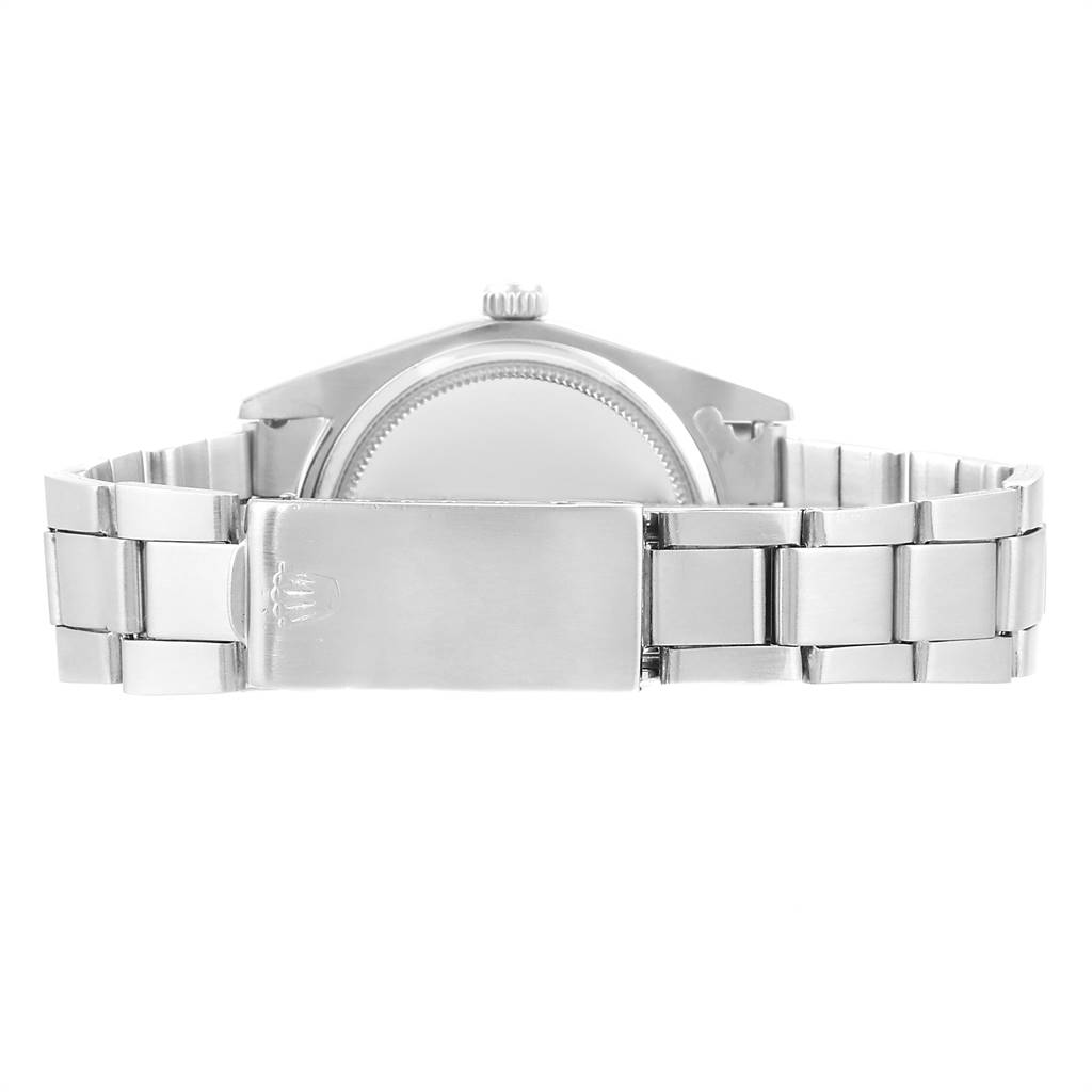 The image shows the back view of a Rolex Vintage Collection 6694 Men's Stainless Steel Black Dial 6694 Men's Stainless Steel Black Dial model, highlighting the bracelet and clasp.