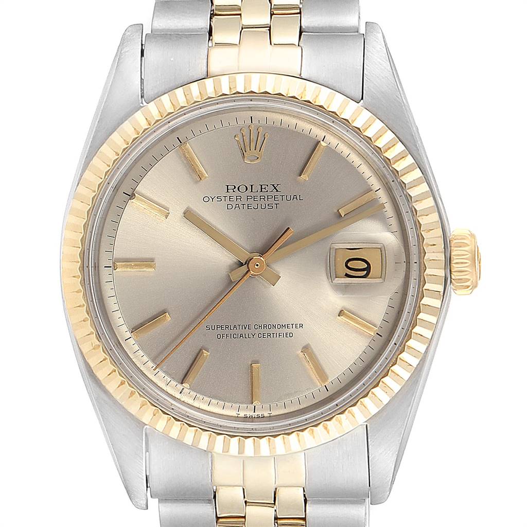 The image shows a frontal view of a Vintage Collection Rolex watch, displaying the dial, bezel, crown, and part of the bracelet.