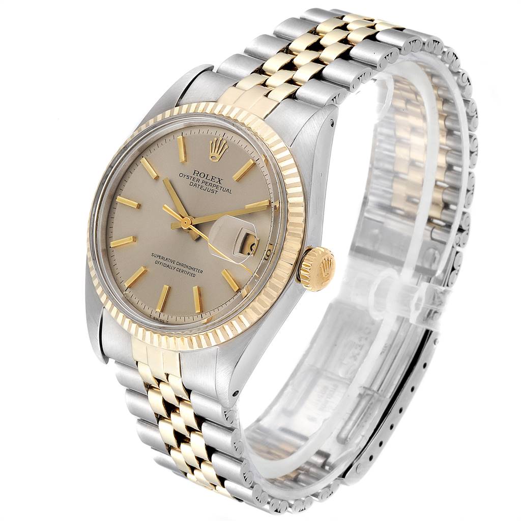 The Rolex Vintage Collection 1601 Men
s Steel and Gold (two tone) Silver Dial 1601 Men
s Steel and Gold (two tone) Silver Dial watch is shown at a three-quarter angle, highlighting the face, bezel, and two-tone bracelet.
