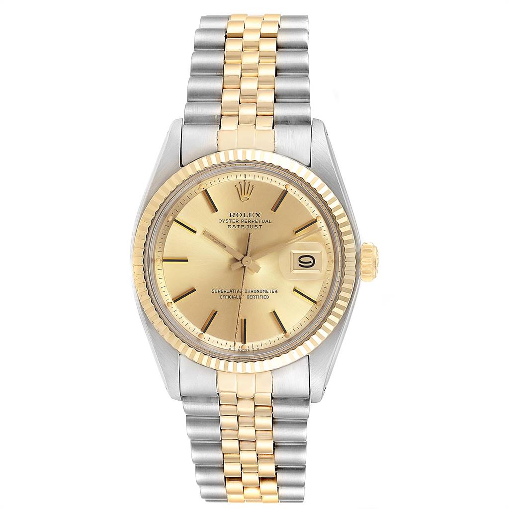 The Rolex Vintage Collection 1601 Men's Steel and Gold (two tone) Champagne Dial 1601 Men's Steel and Gold (two tone) Champagne Dial watch is shown from a top-down angle, highlighting its gold dial, date window, and bi-color bracelet.