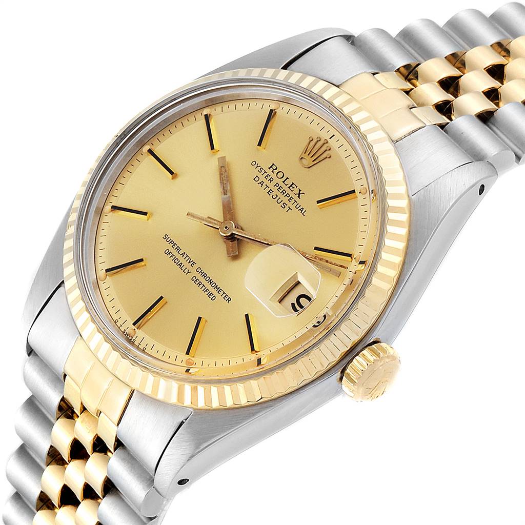 This image shows a close-up of the Rolex Vintage Collection 1601 Men's Steel and Gold (two tone) Champagne Dial 1601 Men's Steel and Gold (two tone) Champagne Dial model watch focusing on its dial, bezel, crown, and part of the bracelet.