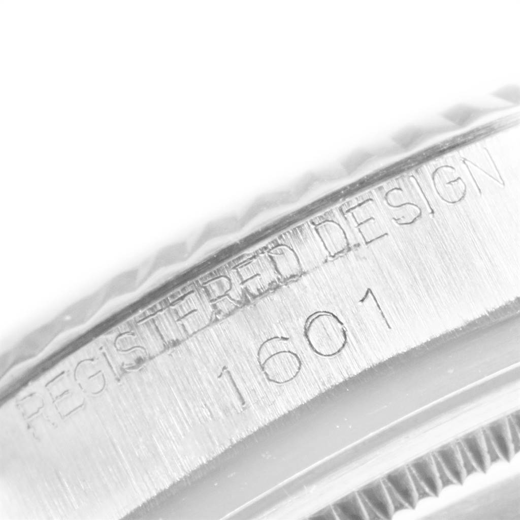 The image shows a close-up of the case and bezel, highlighting the "Registered Design 1601" engraving on the Rolex Vintage Collection 1601 Men's Stainless Steel Silver Dial 1601 Men's Stainless Steel Silver Dial model.