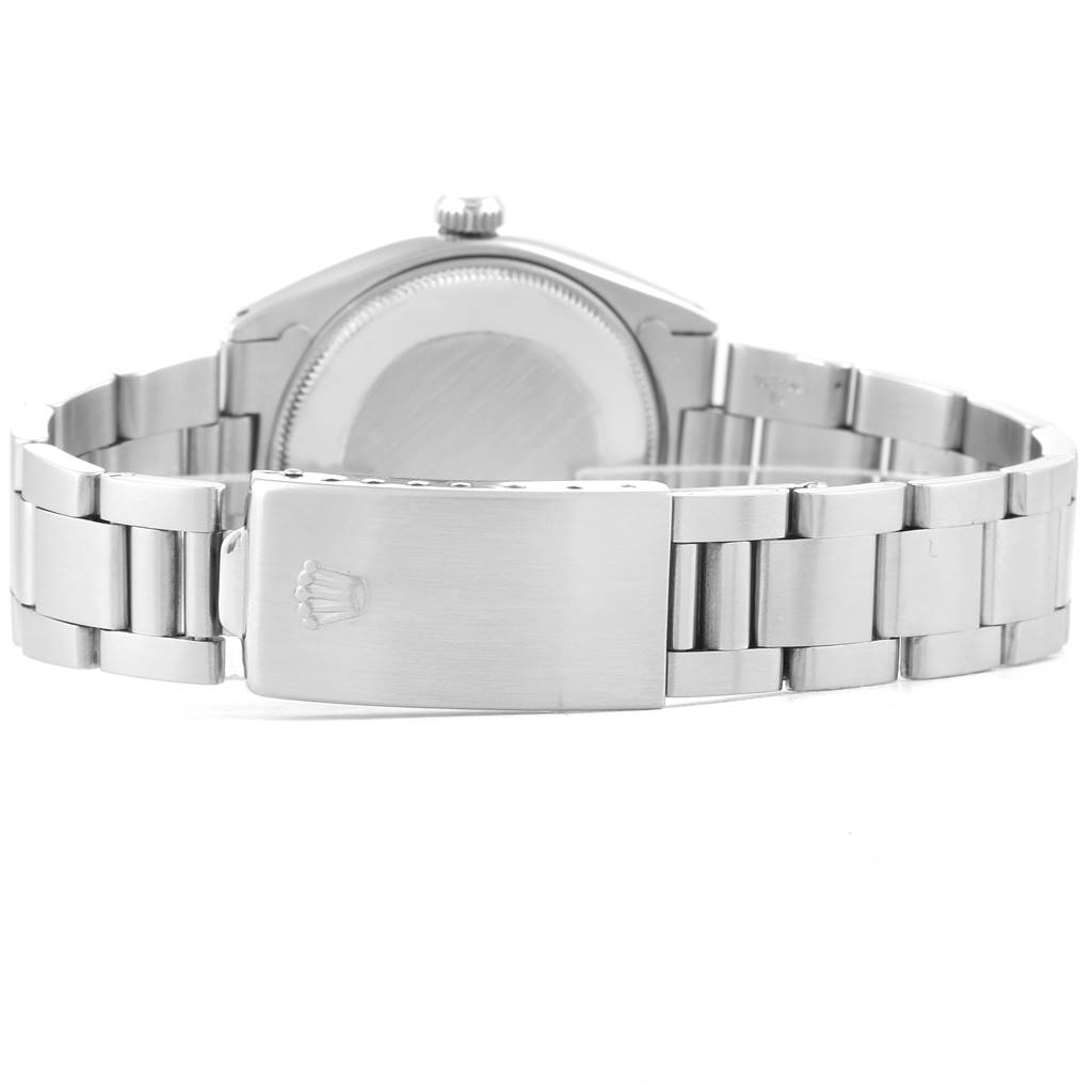 The image shows the back side of a Rolex Vintage Collection 5500 Men's Stainless Steel Silver Dial 5500 Men's Stainless Steel Silver Dial watch, highlighting its bracelet and clasp.