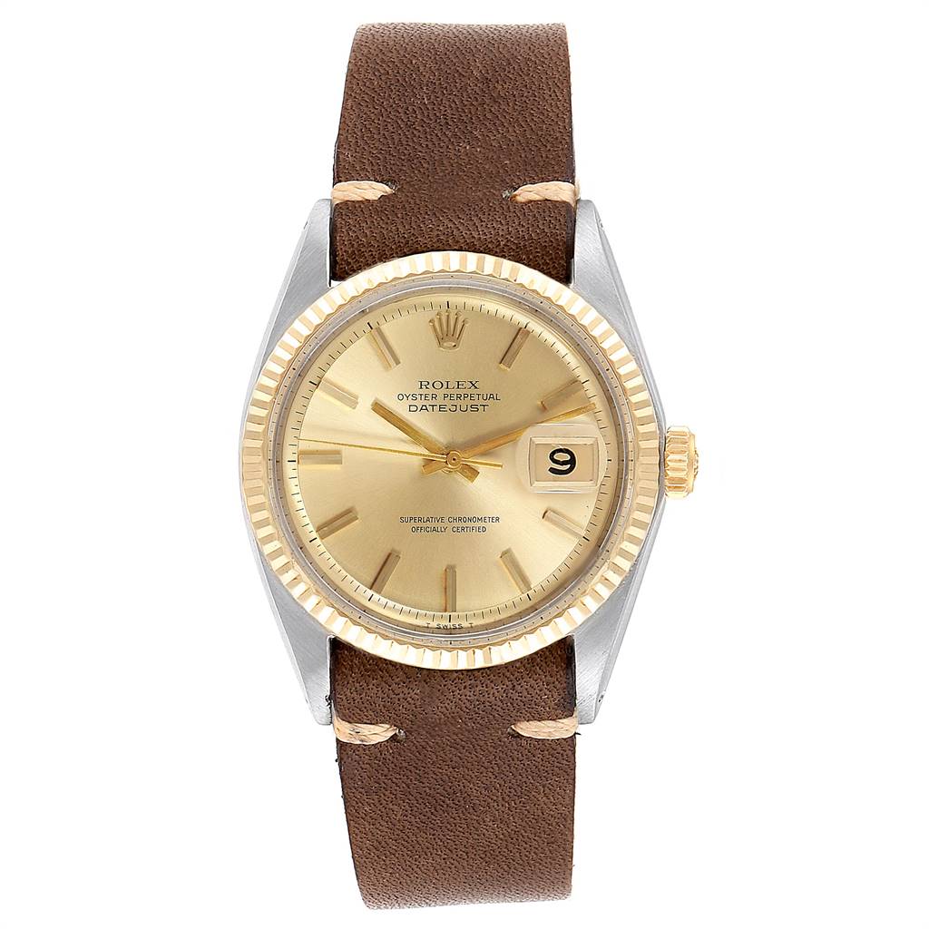 This Rolex Vintage Collection 1601 Men's Steel and Gold (two tone) Champagne Dial 1601 Men's Steel and Gold (two tone) Champagne Dial Datejust watch is shown from the front, displaying the dial, crown, bezel, and brown leather strap.