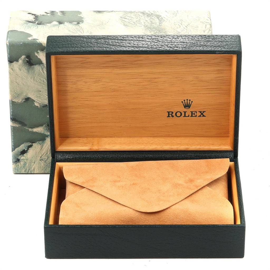 The image shows an open Rolex Vintage Collection 1601 Men's Steel and Gold (two tone) Blue Dial 1601 Men's Steel and Gold (two tone) Blue Dial watch box with a beige suede pouch inside.