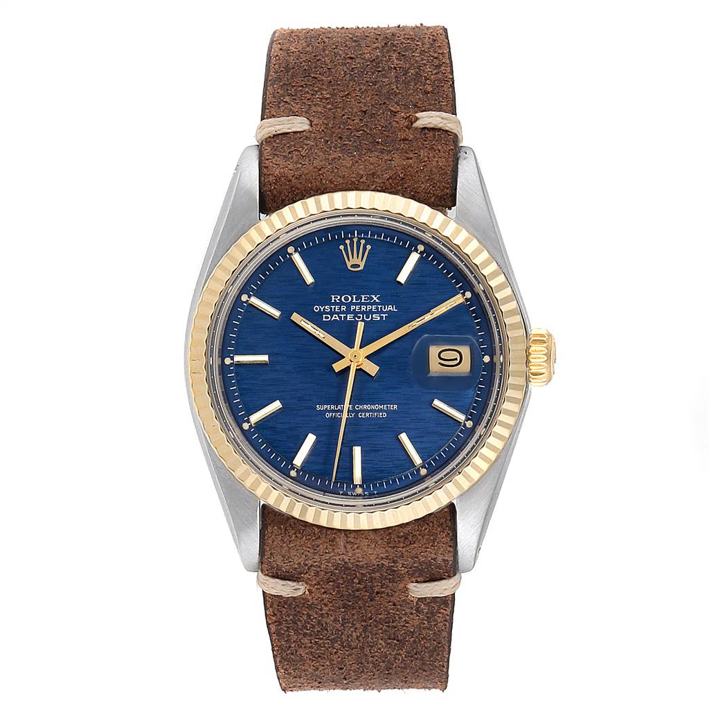 The Rolex Vintage Collection 1601 Men's Steel and Gold (two tone) Blue Dial 1601 Men's Steel and Gold (two tone) Blue Dial model is shown from a front angle, highlighting its dial, bezel, and leather strap.