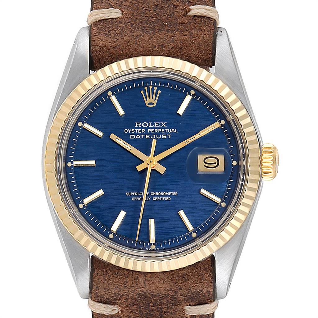 This image shows a frontal view of the Rolex Vintage Collection 1601 Men's Steel and Gold (two tone) Blue Dial 1601 Men's Steel and Gold (two tone) Blue Dial Datejust watch, highlighting the blue dial, gold bezel, and brown leather strap.