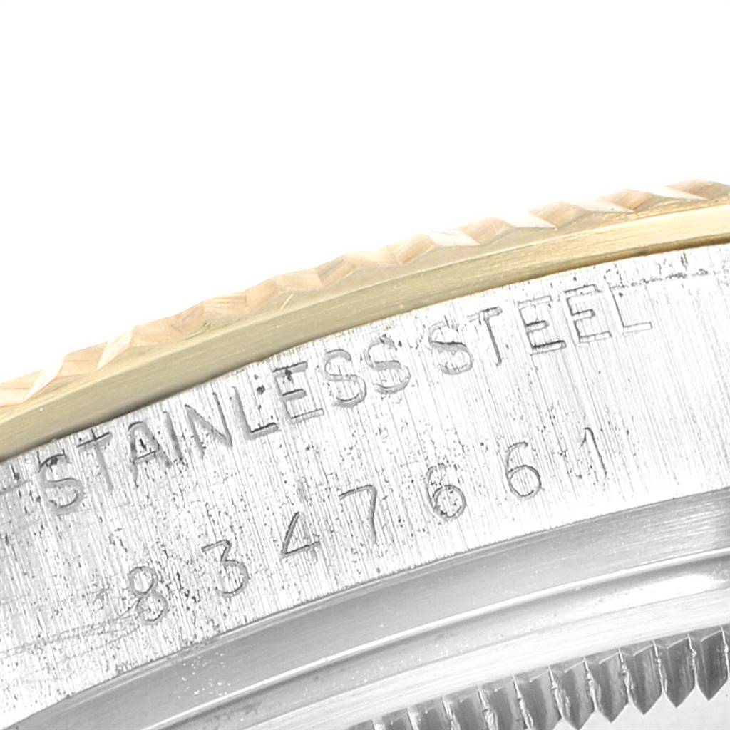 This close-up image shows the stainless steel case back with engraved text of a Rolex Vintage Collection 16013 Men's Stainless Steel Black Dial 16013 Men's Stainless Steel Black Dial model watch.
