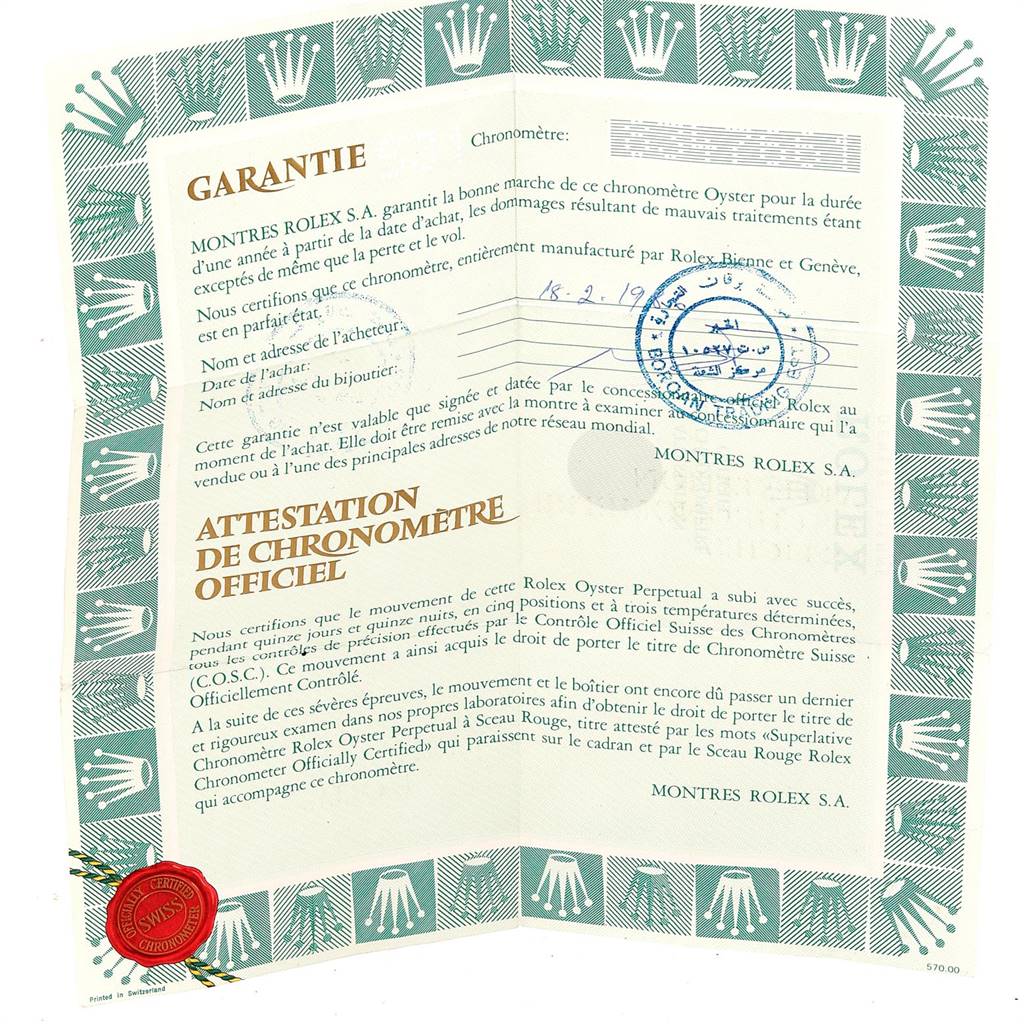 The image shows a warranty certificate and official chronometer certification for the Vintage Collection model by Rolex.