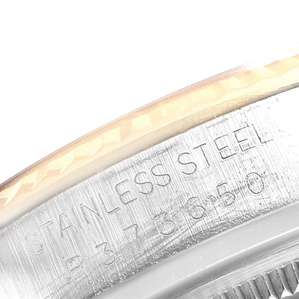 The image shows a close-up of the stainless steel case back with engravings of the Vintage Collection model by Rolex.