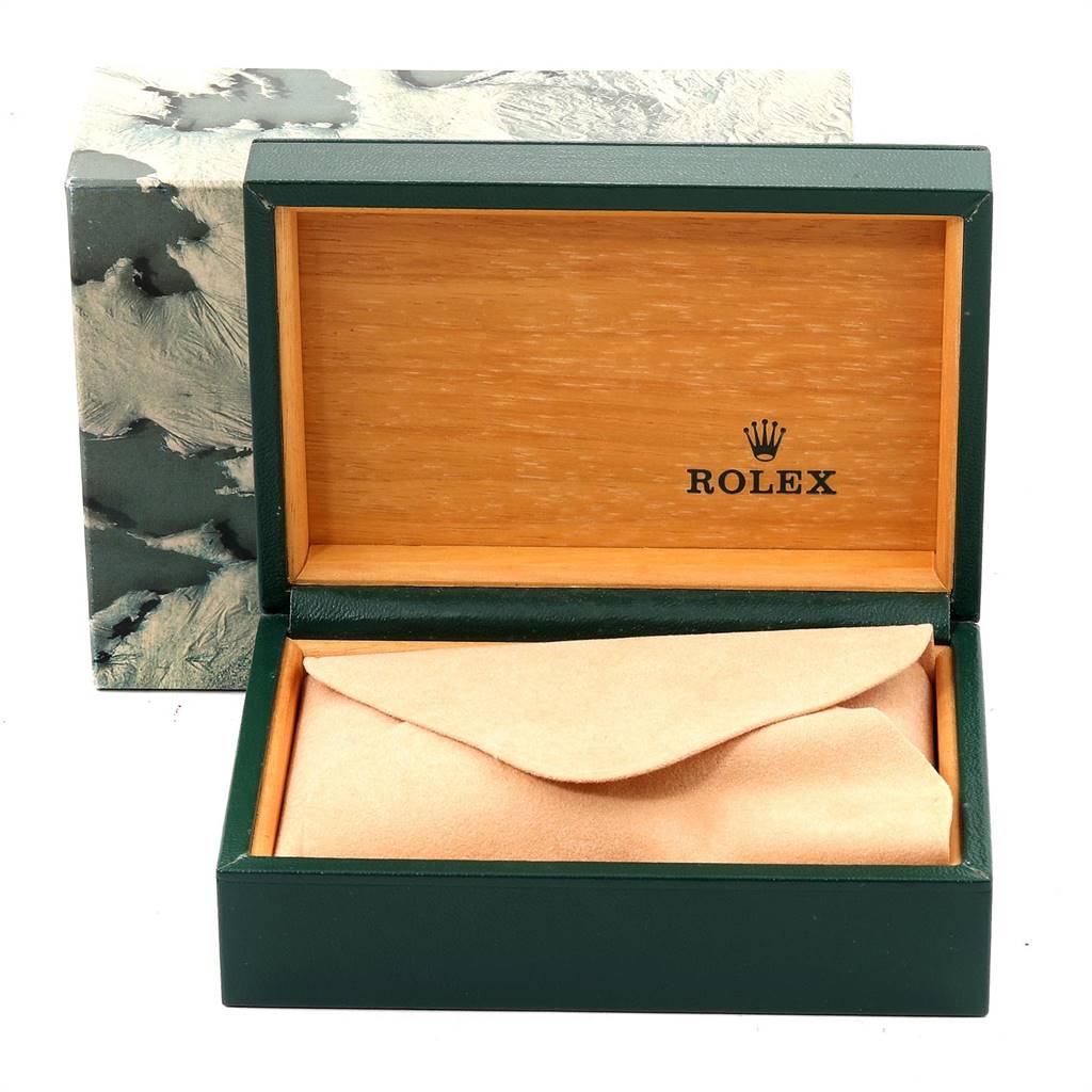 The image shows an open Rolex Vintage Collection 16013 Men's Stainless Steel Champagne Dial 16013 Men's Stainless Steel Champagne Dial watch box with a beige pouch inside.