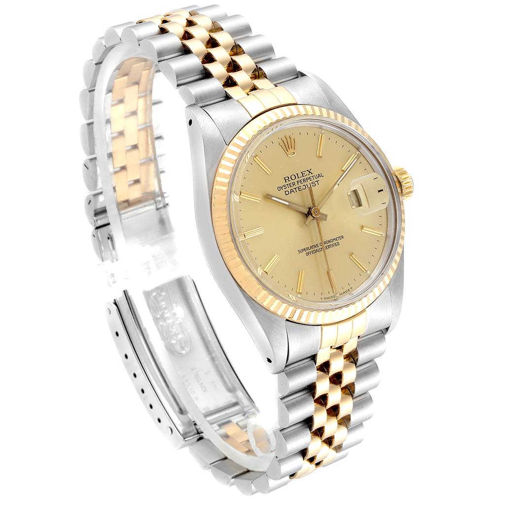 The photo shows a Rolex Vintage Collection 16013 Men's Stainless Steel Champagne Dial 16013 Men's Stainless Steel Champagne Dial Oyster Perpetual Datejust watch, highlighting its two-tone bracelet, case, and dial.