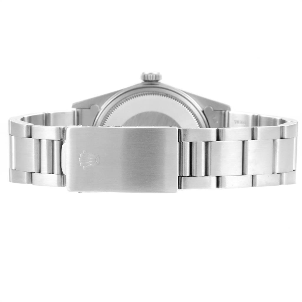 The image shows the back view of the case and bracelet of a Rolex Vintage Collection 16030 Men's Stainless Steel Grey Dial 16030 Men's Stainless Steel Grey Dial watch.