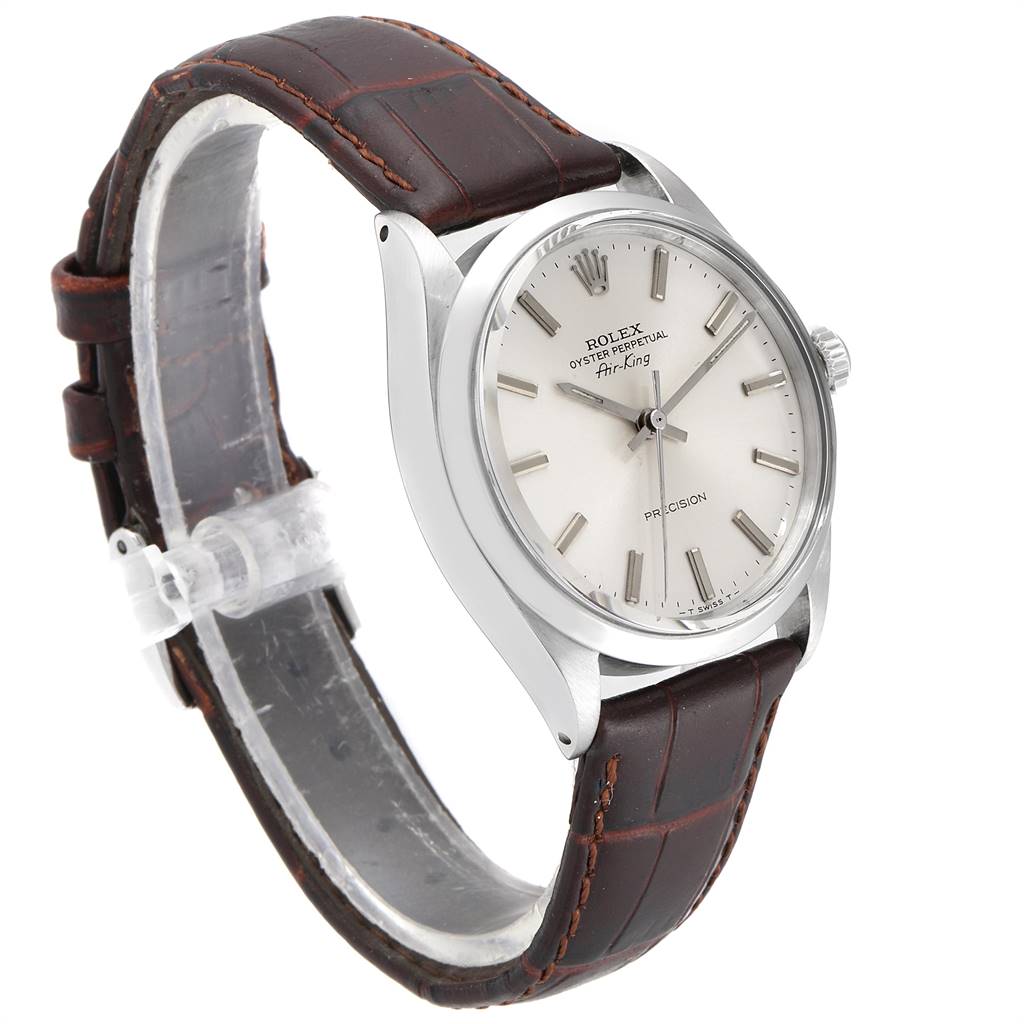 The image shows a side angle of the Rolex Vintage Collection 5500 Men's Stainless Steel Silver Dial 5500 Men's Stainless Steel Silver Dial Air-King watch, highlighting its brown leather strap and silver dial.