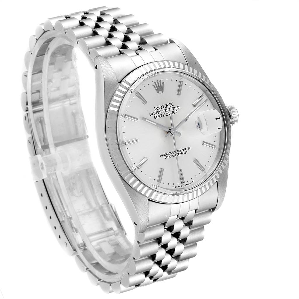 This image shows a Rolex Vintage Collection 16014 Men's Stainless Steel Silver Dial 16014 Men's Stainless Steel Silver Dial Oyster Perpetual Datejust watch, highlighting its face, bezel, and metal bracelet at an angled view.