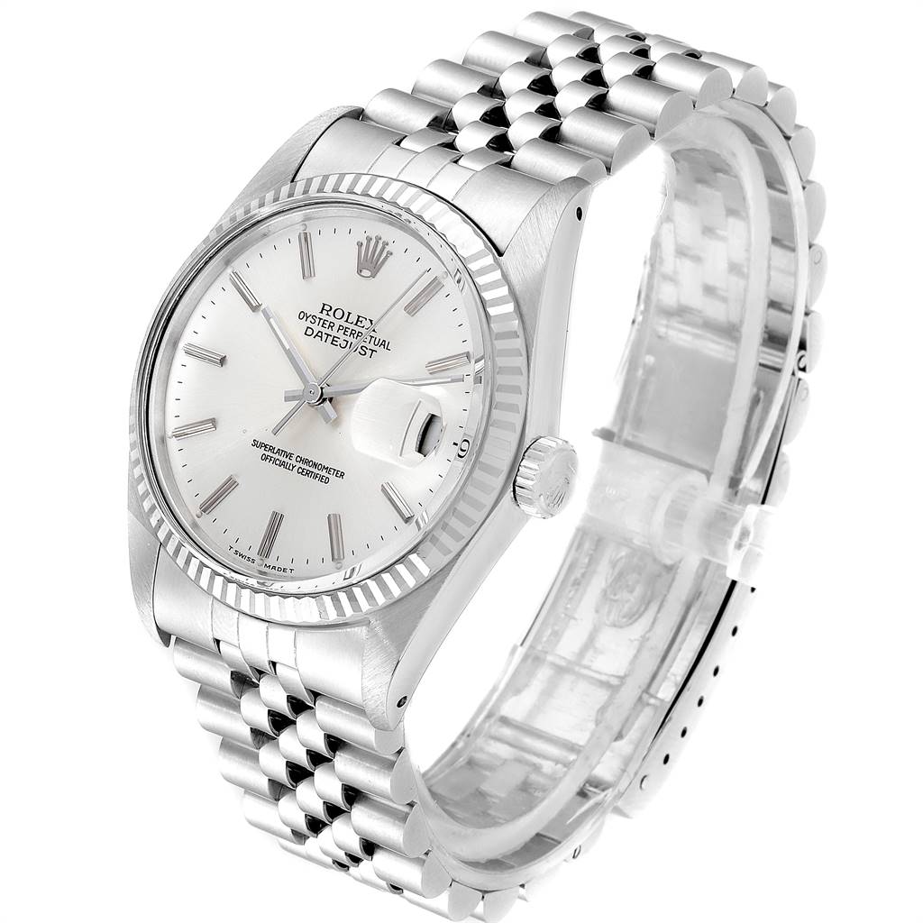 The watch, a Vintage Collection model by Rolex, is shown at an angled view displaying the face, crown, and bracelet.